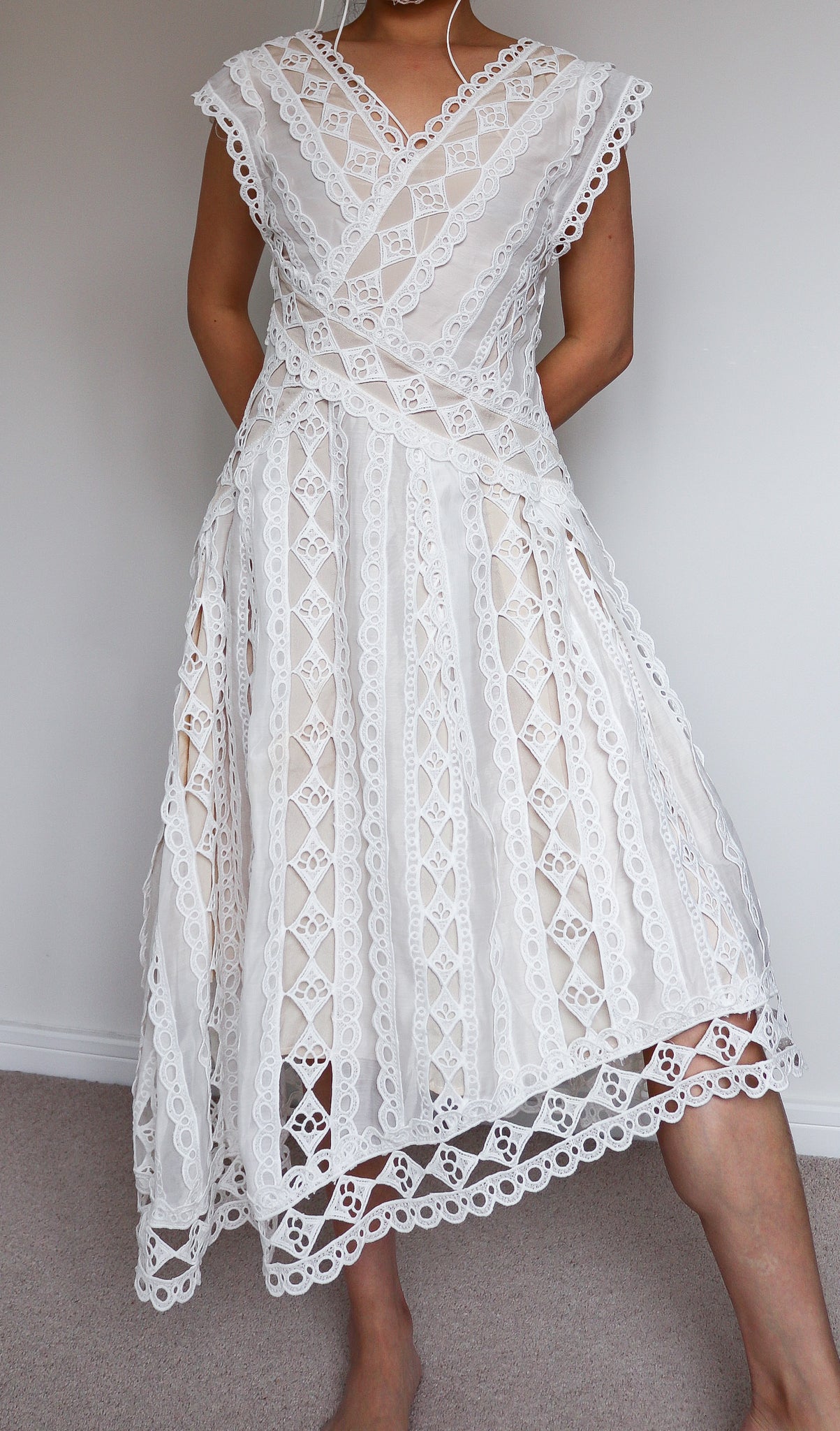 WHITE LACE DRESS WITH ASYMMETRICAL HEM