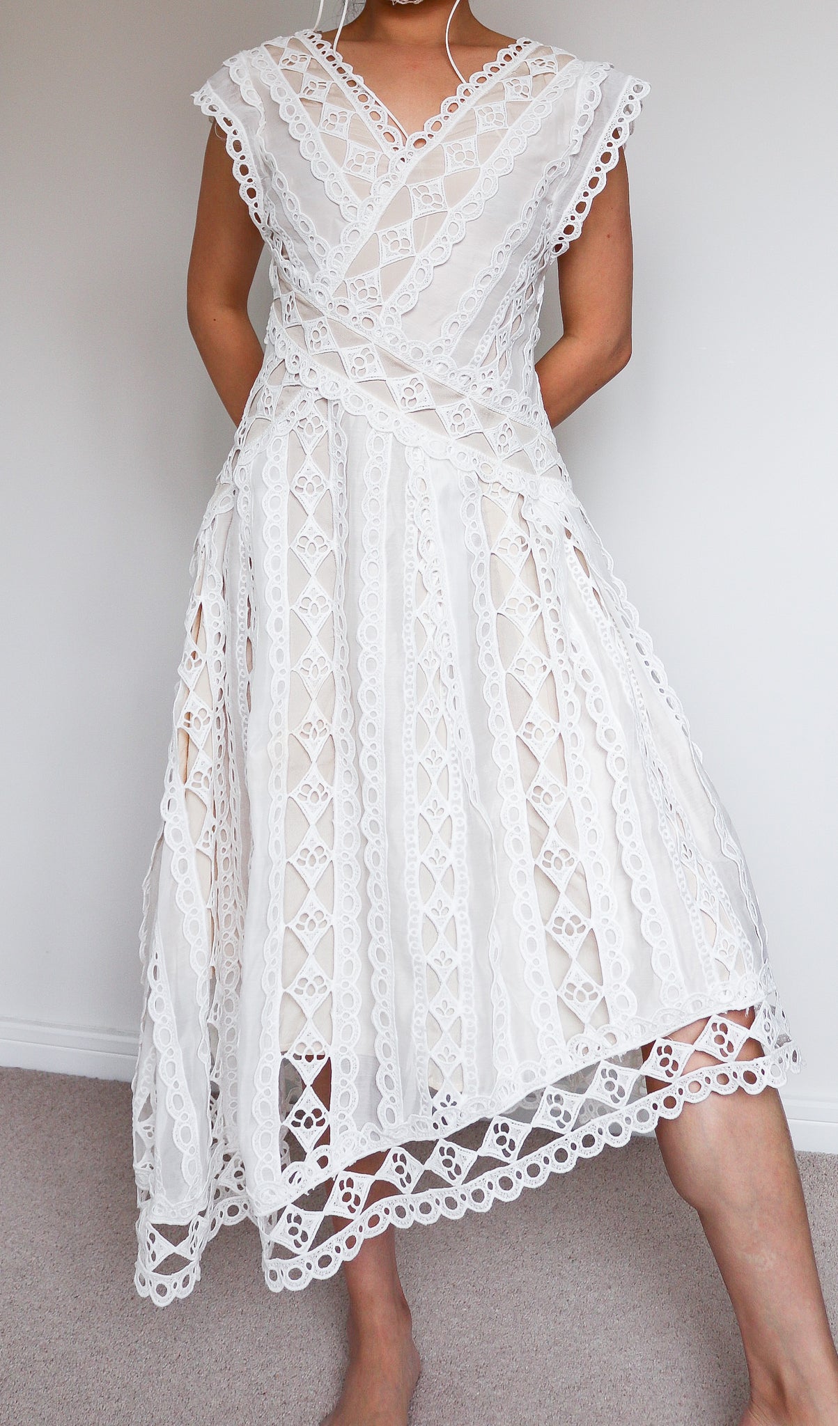 WHITE LACE DRESS WITH ASYMMETRICAL HEM