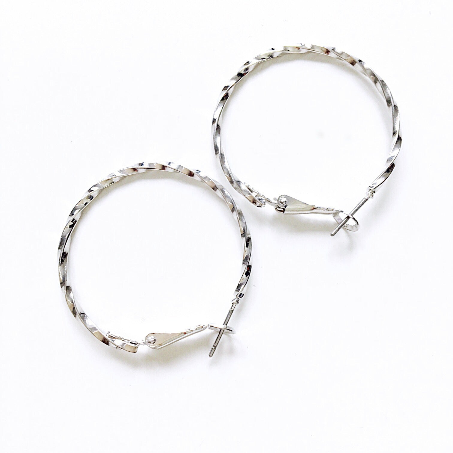 TWISTED HOOP EARRINGS