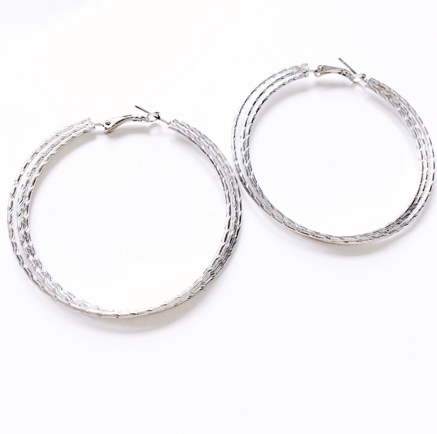 TRIPLE TWISTED HOOP EARRINGS