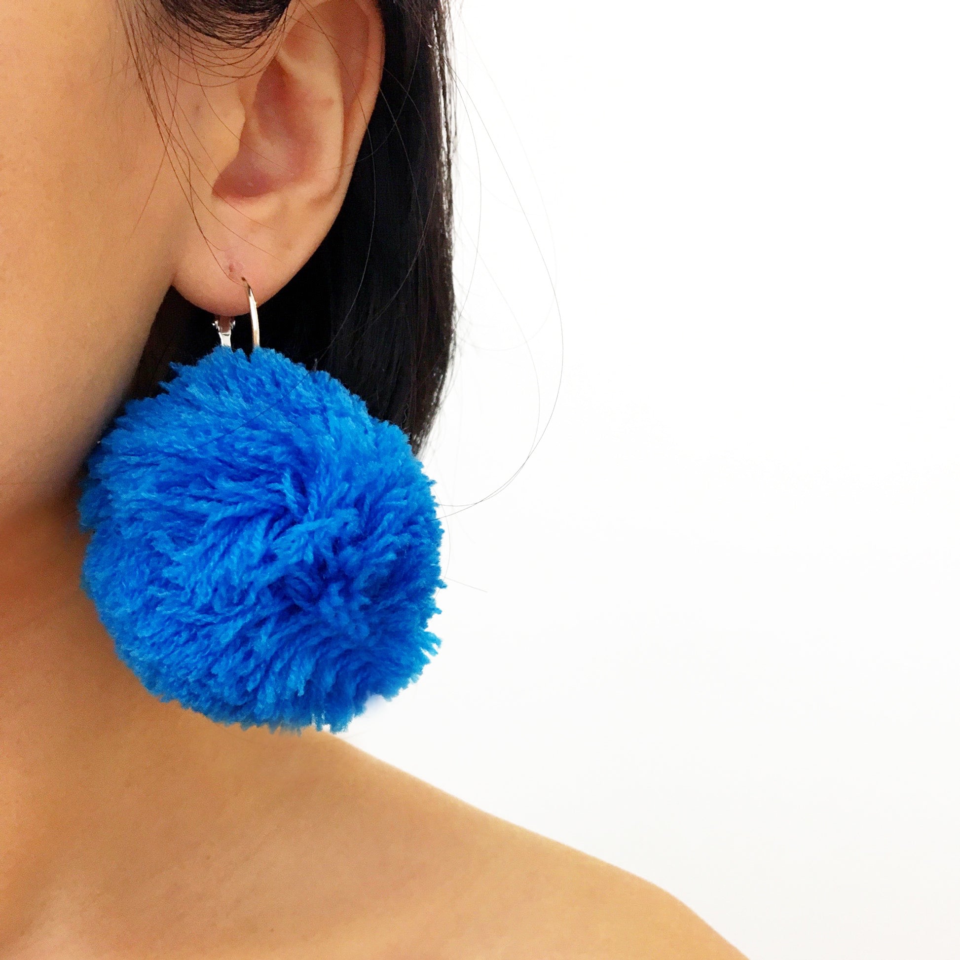 LARGE POM POM SMALL HOOP EARRINGS