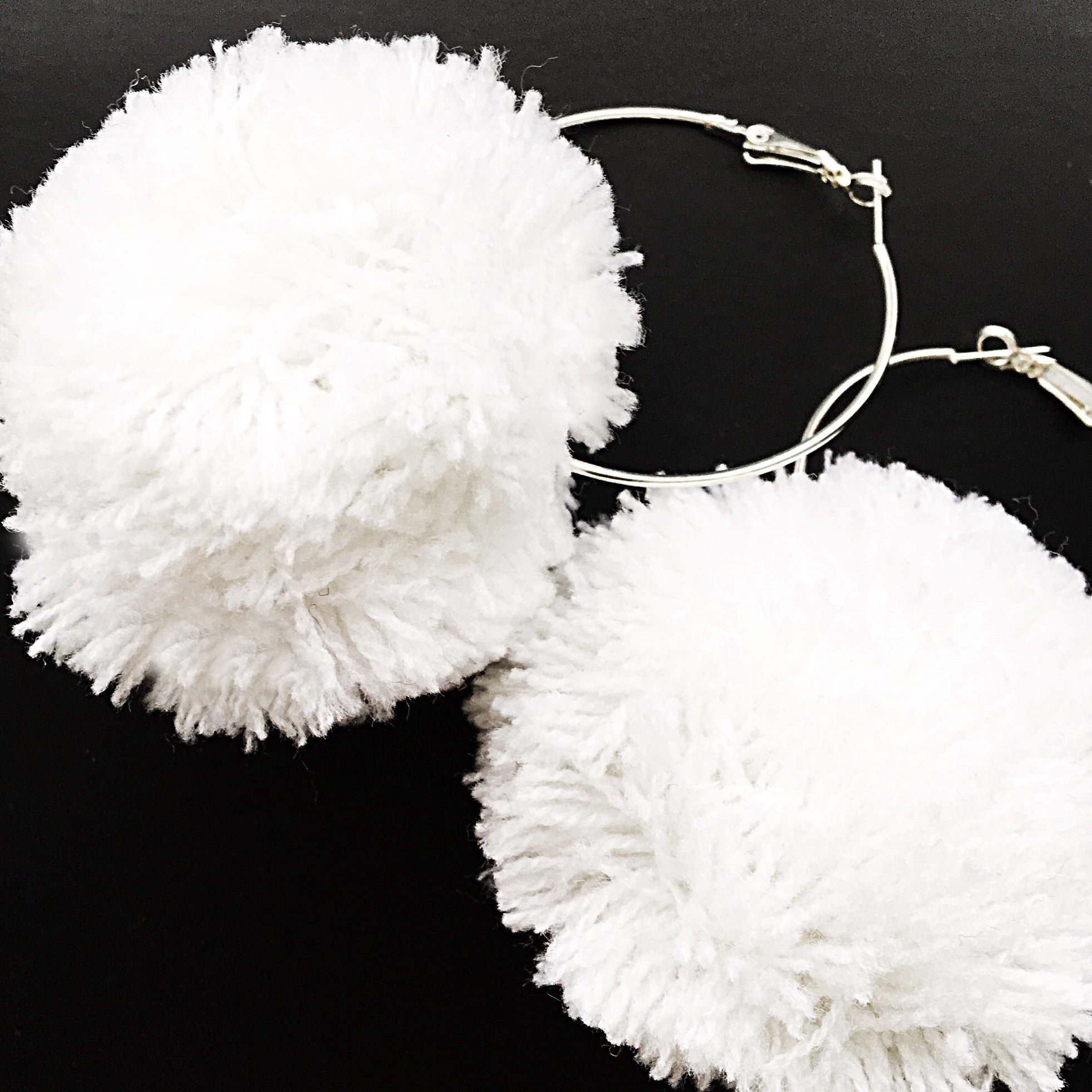 LARGE POM POM HOOP EARRINGS