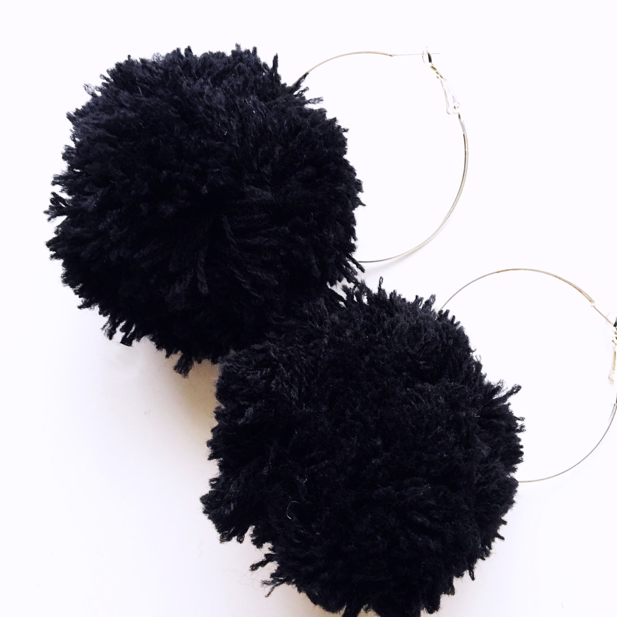 LARGE POM POM HOOP EARRINGS