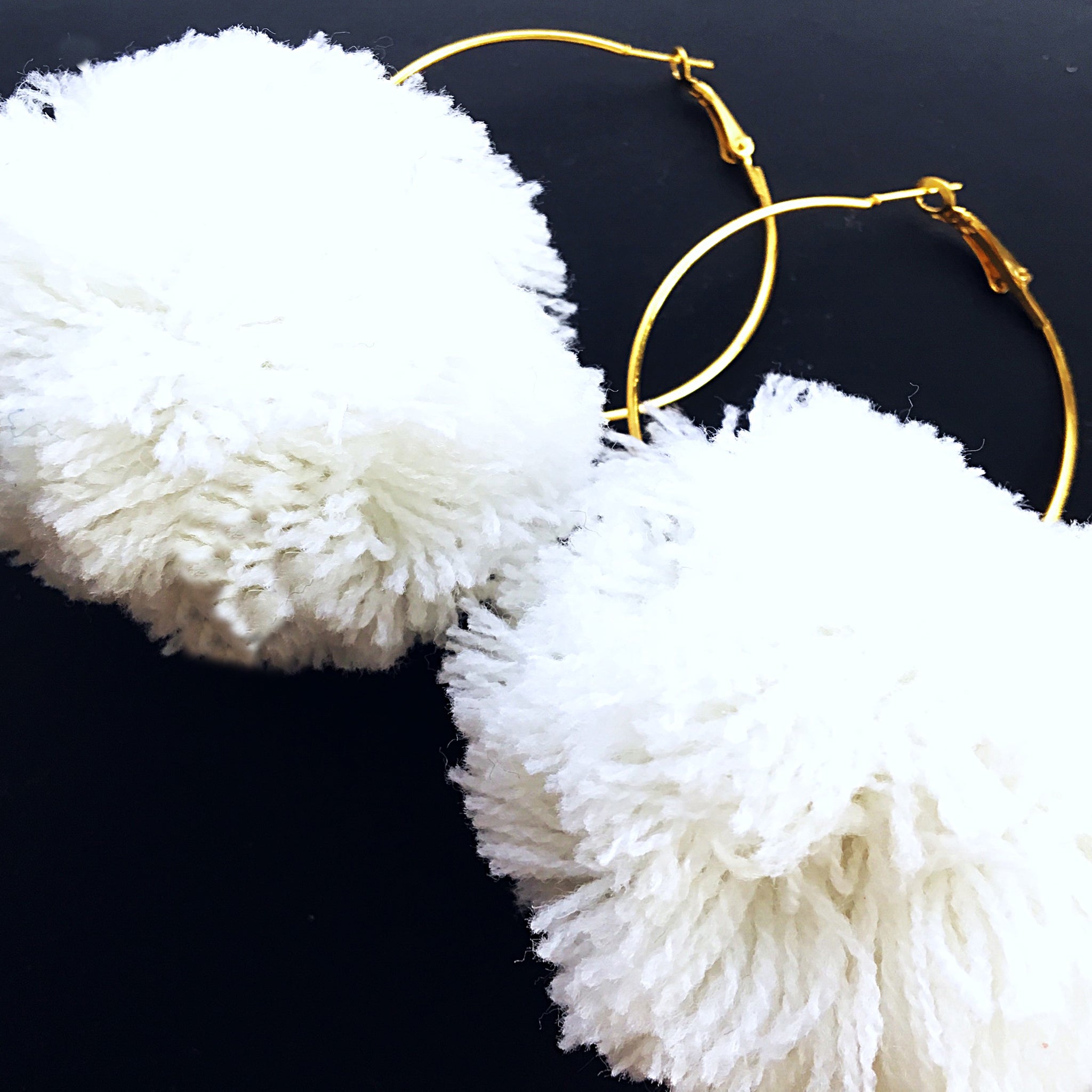 LARGE POM POM HOOP EARRINGS